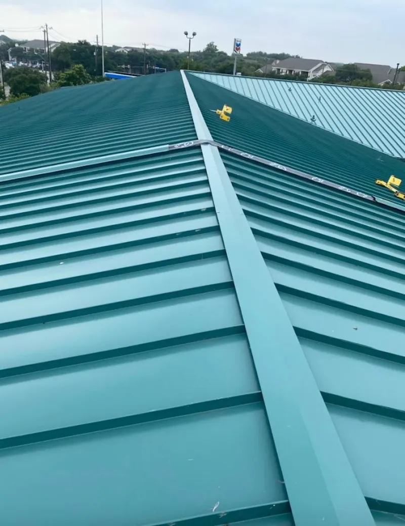Green commercial metal roof ridge and valley for Metal Roof Repair in Hastings-on-Hudson